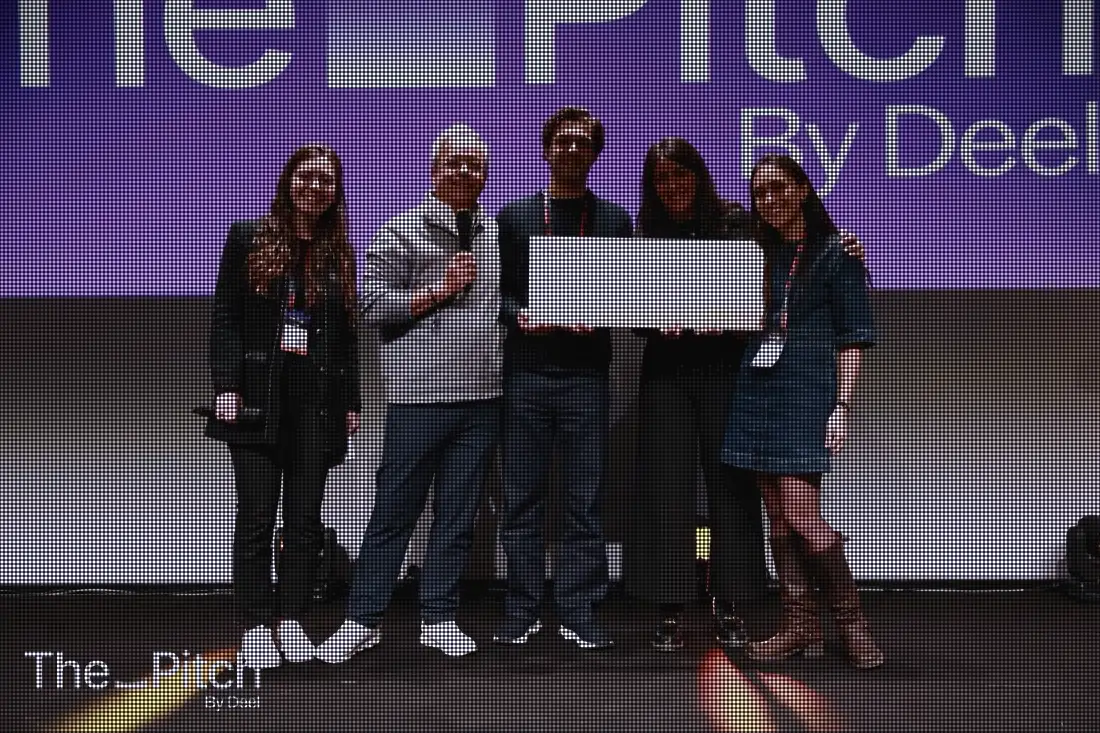 On stage at The Pitch by Deel, at Station F